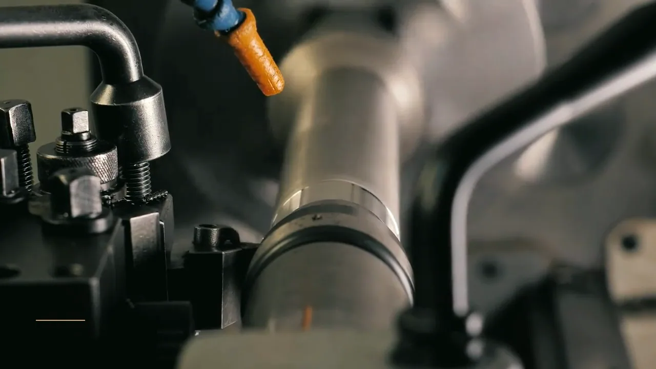 A rotary cutter working against metal, from the Forge manufacturing film.